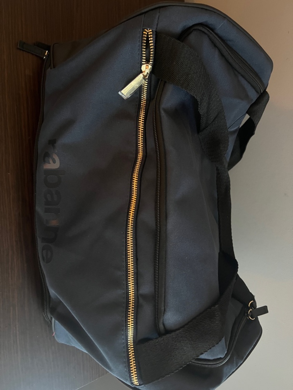 Paco Rabanne Black Duffel Bag with Gold Zipper